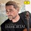 Text: "DAVID GARRETT IMMORTAL". Logo oben rechts. Ein Mann mit zusammengebundenen Haaren und einer Geige.