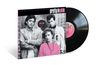"Pretty in Pink" und "Original Motion Picture Soundtrack" sind in einem Coverbild mit drei Personen und einer Vinylplatte zu sehen.