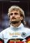 "Rudi Völler - Einer für alle" und "Christoph Bausenwein" in weißem Text. Person in Trainingsjacke mit Deutschland-Logo.