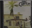 "ERIC CLAPTON 461 OCEAN BOULEVARD" steht oben rechts. Ein Haus mit Palmen und eine Person lehnt an einem Baum., CD