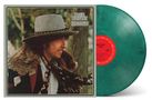 Text: "Bob Dylan Desire". Das Cover zeigt eine Person mit Hut und Fellmantel; daneben eine grüne Vinyl-Schallplatte., LP