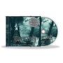 "DUSK... AND HER EMBRACE 30th Anniversary Edition" steht auf einem CD-Case, eine Frau im Wald mit Schloss im Hintergrund., CD