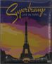 "Supertramp Live in Paris '79" in gelber Schrift. Silhouette des Eiffelturms vor farbigem Himmel, lila und orange Töne.