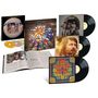 "The Beach Boys" und "The Beach Boys Love You" auf Albumhüllen, Buch offen mit Text, 3 CDs, 3 Schallplatten, farbenfrohes Design., 5 LPs und 1 CD