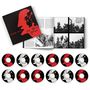CD-Box-Set "The Pretty Things". Schwarzes und rotes Cover. Offenes Buch mit Schwarzweißfotos einer Band., 12 CDs