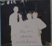 Der Text lautet: "in heaven there's rainbows". Vier Personen stehen nebeneinander, ihre Gesichter sind stark überbelichtet., CD
