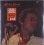 Text: „Héctor Lavoe. Que Sentimiento! The first and only self-produced album by Héctor Lavoe.“  
Mann mit Mikrofon, trägt Brille., LP