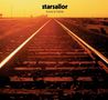 Text: "starsailor love is here". Ein Bahngleis führt in die Ferne unter einem orangefarbenen Himmel., 2 CDs