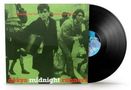 "Searching for the young soul rebels." Foto mit Menschen in Bewegung, ein Vinyl mit schwarz-grünem Cover., LP