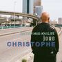 Texte: "BACHAR MAR-KHALIFÉ joue CHRISTOPHE". Eine Person von hinten, mit Glatze, vor einer Stadtkulisse., LP