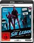 Cover von "SIE LEBEN": Mann mit Sonnenbrille und Waffe. Schlagwörter wie "OBEY", "CONSUME". FSK ab 18.