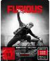 Oben steht "THE FURIOUS". Darunter ein Mann in Aktion mit Hammer, bedrohliche Szene im Schwarz-Weiß-Stil.