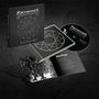 Albumcover "REINKAΩS" von Dissection. Schwarzes CD-Cover mit symbolischem Kreis und Booklet mit Drachen-Illustration., CD