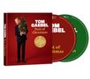 Cover mit "TOM GAEBEL Best of Christmas", CDs rot und grün sichtbar. Mann im Anzug hält Weihnachtsbaum., 2 CDs