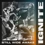 Text: "STILL WIDE AWAKE" und "IGNITE". Vier Bilder von energiegeladenen Musikern bei einem Auftritt., CD
