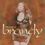"The Best of Brandy" in großer Schrift, mit einer Frau in stilvoller Pose vor einem abstrakten, warmen Hintergrund., CD