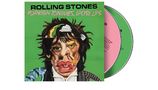 "ROLLING STONES FOREIGN TONGUES, LOOSE LIPS" auf grünem Hintergrund; verzerrtes Porträt, zwei CDs dahinter sichtbar., 2 CDs