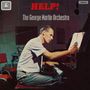 Text: "HELP!", "The George Martin Orchestra". Ein Mann sitzt am Klavier und schreibt Noten auf ein Blatt Papier., CD
