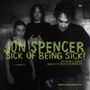 Schwarz-weiß Foto von drei Personen vor einer Wand mit Kritzeleien. Text: "Jon Spencer Sick of Being Sick!"., LP