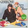 "CERRONE", "Love In C Minor". Mann in schwarzem Gewand, Frau mit grünem Tuch, Kleidung am Boden. 50th Anniversary Sticker., LP
