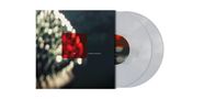 Text in der Mitte: "MOVEMENTS AND INTERIORS". Links unscharfe Lichter, roter Bereich. Zwei transparente Schallplatten sichtbar., 2 LPs