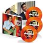 "The Very Best Of Johnny Mathis" auf CD-Cover und Hüllen. Drei orangefarbene Schallplatten mit "Now" und "Johnny Mathis"., 3 CDs