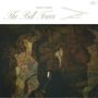 Text: "REBEKKA KARIJORD", "The Bell Tower", Songtitel in kleiner Schrift. Illustration: Frau vor abstraktem, düsterem Hintergrund., CD