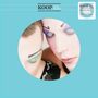 Text oben: KOOP Koop Islands. Rechts: 2026 Re-Issue, featuring extra track Strange Love. Zwei Gesichter mit buntem Makeup., LP