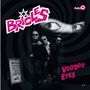"Brigles" in pink mit Stern, "Voodoo Eyes" in pink. Schwarz-weißes Bild mit drei Männern in Sonnenbrillen vor spiralförmigem Hintergrund., LP