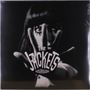 Text: "The Jackets Essentials". Eine schwarz-weiße Aufnahme: Hand vor dem Gesicht einer Person, dramatisches Licht., LP