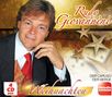 Text vorne: "Rudy Giovannini", "Weihnachten", "Der Caruso der Berge", "4 CD Box", "Melodie Express". Person in Anzug. Sterne im Hintergrund., 4 CDs