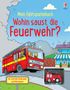 Text: "Mein Fahrspurenbuch Wohin saust die Feuerwehr? mit Aufzieh-Feuerwehr und Fahrspuren."  
Illustration: Rotes Feuerwehrauto mit Feuerwehrleuten., Buch