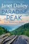 Text: "Janet Dailey, Paradise Peak, New Americana Series". Eine schöne Berglandschaft mit Bäumen und Felsen bei Sonnenuntergang.