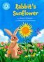 "Rabbit’s Sunflower" von Sheryl Webster und Marylore Seecharan. Ein Hase mit Korb steht in einer bunten Blumenwiese vor einer Sonnenblume.