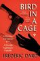 „Bird in a Cage“. „Hugely atmospheric“ - The Times. „Classic French noir“ - Guardian. Eine Pistole über einer Hand., Buch