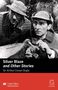 "Silver Blaze and Other Stories, Sir Arthur Conan Doyle." Zwei Männer in Detektivkleidung, der rechte hält eine Lupe., 1 Buch und 1 Diverse