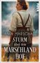 "Anja Marschall, Sturm über dem Marschlandhof, Roman." Eine Frau steht im Feld, der Himmel ist bewölkt und dramatisch., Buch