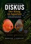 Text: "DISKUS Der König im Aquarium", "Marcus Liprecht, Ausgabe 2026". Zwei bunte Diskusfische, Pflanzen im Hintergrund., Buch