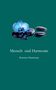 Text: "Mensch und Harmonie", "Karsten Hartmann". Eine blaue Blume liegt auf glatten, schwarzen Steinen vor grünem Hintergrund., Buch