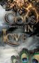 "Gods in Love", "Mia Montague", "Jupiter's Judgment". Goldene Ornamente, Blitz, Pfauenfedern im Hintergrund., Buch