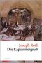 "Joseph Roth: Die Kapuzinergruft" steht in großen Buchstaben. Gemälde von Männern in einem gemütlichen Café mit Zeitungen., Buch
