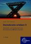 "Demokratie erleben II", Wirtschaftskunde BFS II, Saarland. Metallstruktur vor Sonnenuntergang, Europa-Lehrmittel-Logo., Buch