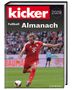 Text: "kicker 2028 Fußball Almanach". Ein Fußballspieler in roter Kleidung schießt den Ball auf dem Rasen., Buch