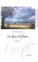Text: "Udo Houben, in den lüften, Gedichte, LICHtpunkte, TRIGA".  
Szene: Ein Flussufer mit Baum und Wolkenhimmel., Buch