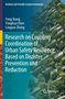 Titel zeigt Forschung zu städtischer Sicherheitsresilienz. Autoren: Yong Xiang, Yonghua Chen, Lingyun Zheng. Gebäude mit Pflanzen., Buch