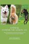 Text: "Animal Communication 101" und "Joan Ranquet". Drei Bilder: lächelnder Hund, orangefarbene Katze, galoppierendes Pferd., Buch