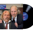 Text: Philippe Katerine, Nouvel album 'Planète Bleue'. Zwei Männer mit Anzügen, einer erschöpft, der andere lächelt. Schallplatte.