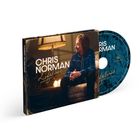Auf einem Albumcover steht "CHRIS NORMAN Lifelines". Ein Mann sitzt in einem warm beleuchteten Raum.