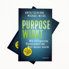 Buchtitel: "Purpose wirkt". Autores: Anita Tscherne, Michael Weiss. Element: Zwei übereinanderliegende Bücher.