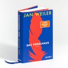 "JAN WEILER, DAS VOGELHAUS, SPIEGEL Bestseller-Autor, HEYNE." Blaues Cover, roter Vogelschatten, orangefarbener Aufkleber.